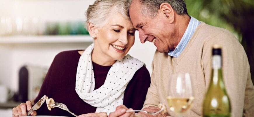 Senior,Couple,,Dinner,And,Smile,In,Home,For,Anniversary,,Date